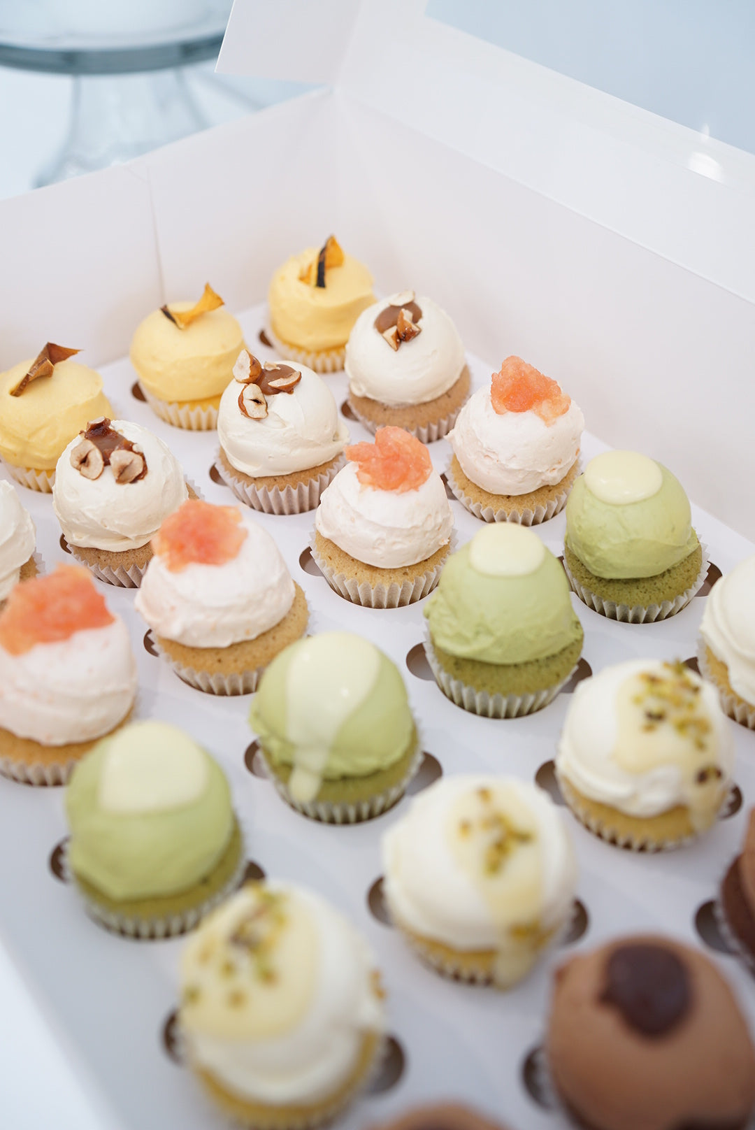 Assorted fresh cream cupcakes