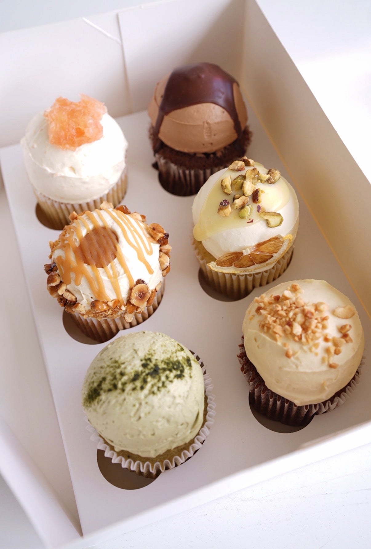 Assorted fresh cream cupcakes